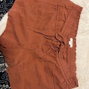 Rust colored LOFT shorts.
